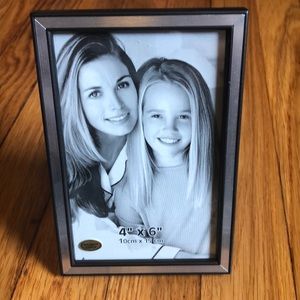 Silver and black metal frame.